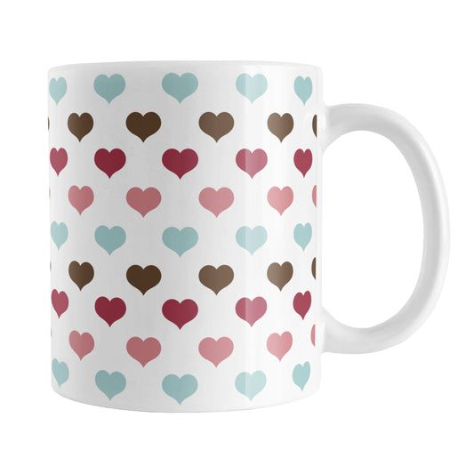 Berry Blue Summer Hearts Mug (11oz) at Amy's Coffee Mugs. A ceramic coffee mug designed with a polka-dotted pattern of hearts in a gorgeous summer color combination of berry pink hues, aqua blue, and brown over white. It makes an adorable gift for Valentine's Day as well with its unique and sweet color palette.