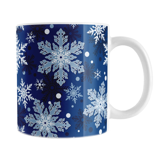 Classic Blue Snowflake Pattern Winter Mug (11oz) at Amy's Coffee Mugs. A ceramic coffee mug designed with a pattern of different shades of blue snowflakes over a classic blue background color that wraps around the mug.