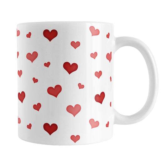 Dainty Cute Red Hearts Mug (11oz) at Amy's Coffee Mugs. A ceramic coffee mug designed with a print of cute and dainty hand-drawn re hearts in different shades of red in a pattern that wraps around the mug up to the handle.