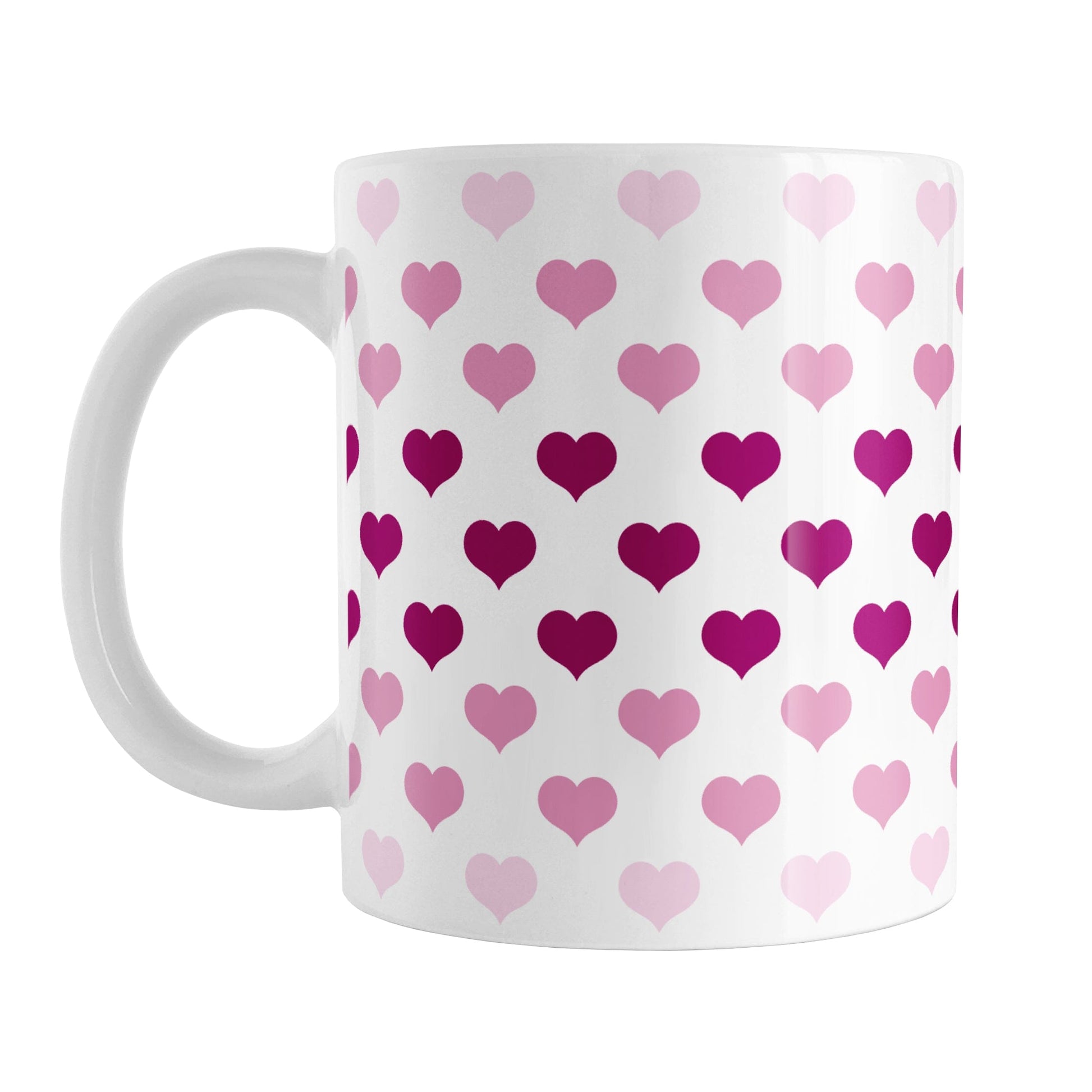 Hearts in Pink Mug (11oz) at Amy's Coffee Mugs. A ceramic coffee mug designed with hearts in different shades of pink, with the darker pink color across the middle and the lighter pink along the top and bottom, in a pattern that wraps around the mug to the handle.