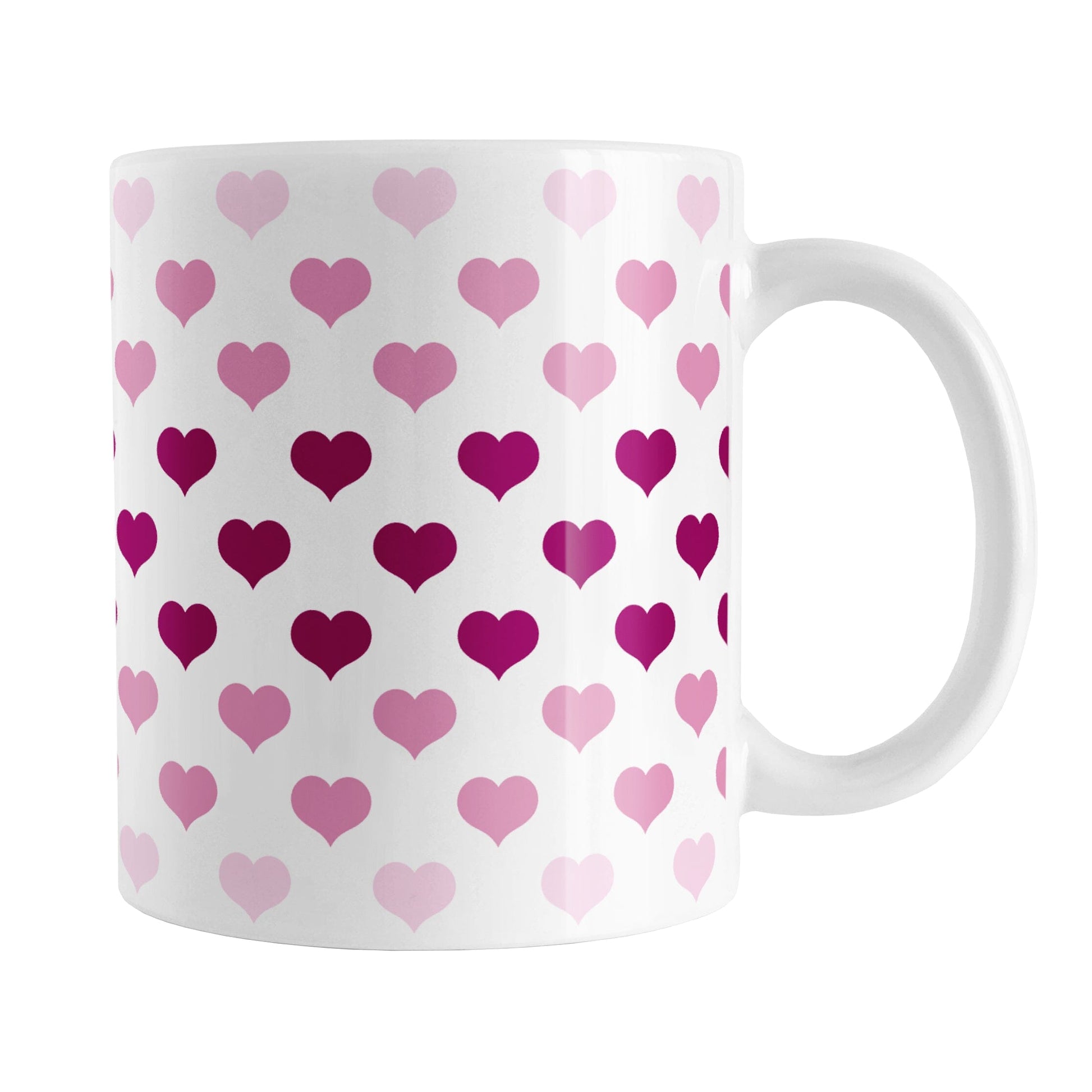 Hearts in Pink Mug (11oz) at Amy's Coffee Mugs. A ceramic coffee mug designed with hearts in different shades of pink, with the darker pink color across the middle and the lighter pink along the top and bottom, in a pattern that wraps around the mug to the handle.