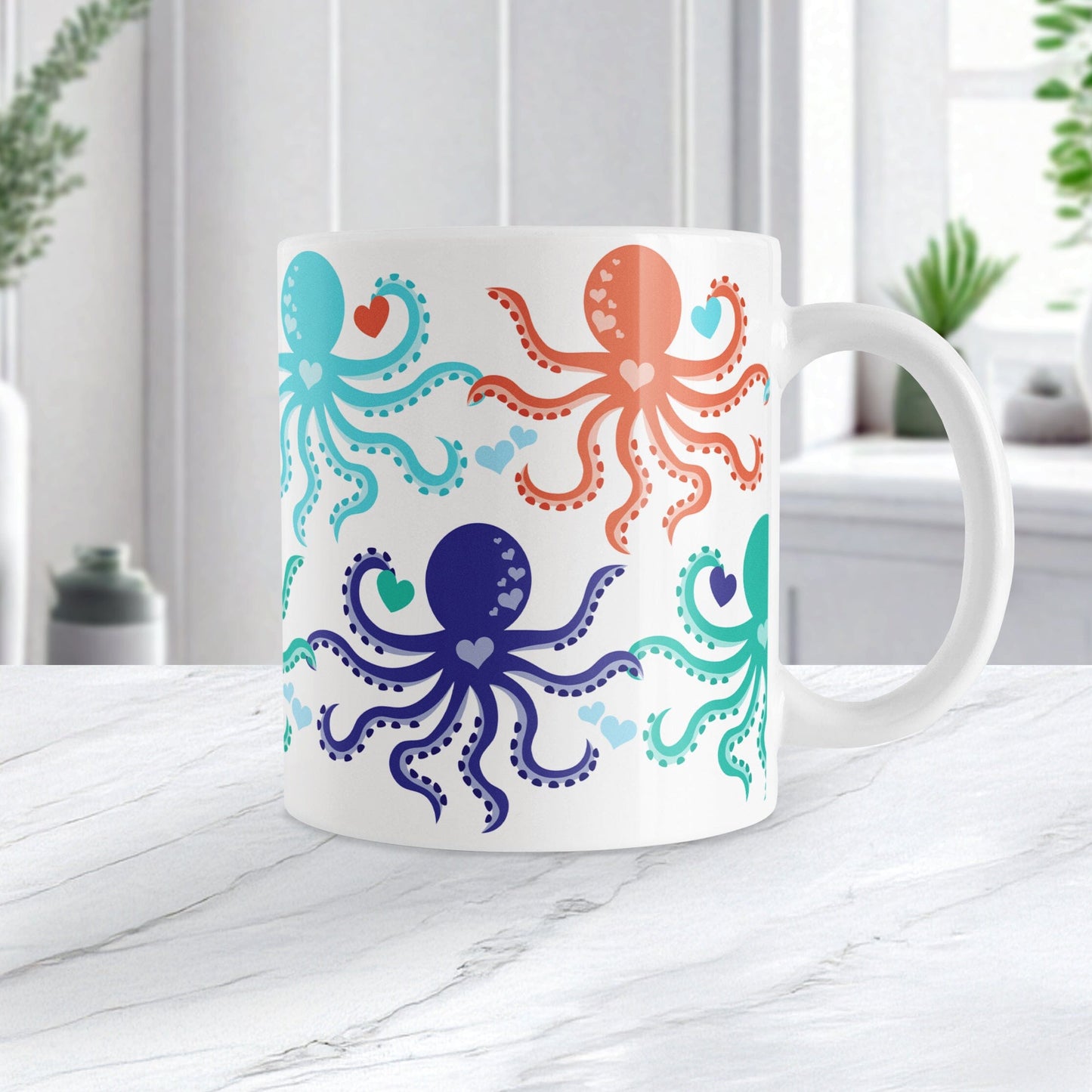 11oz white ceramic mug with a colorful, coastal-inspired octopus pattern. Photo shows the mug on a marble countertop.