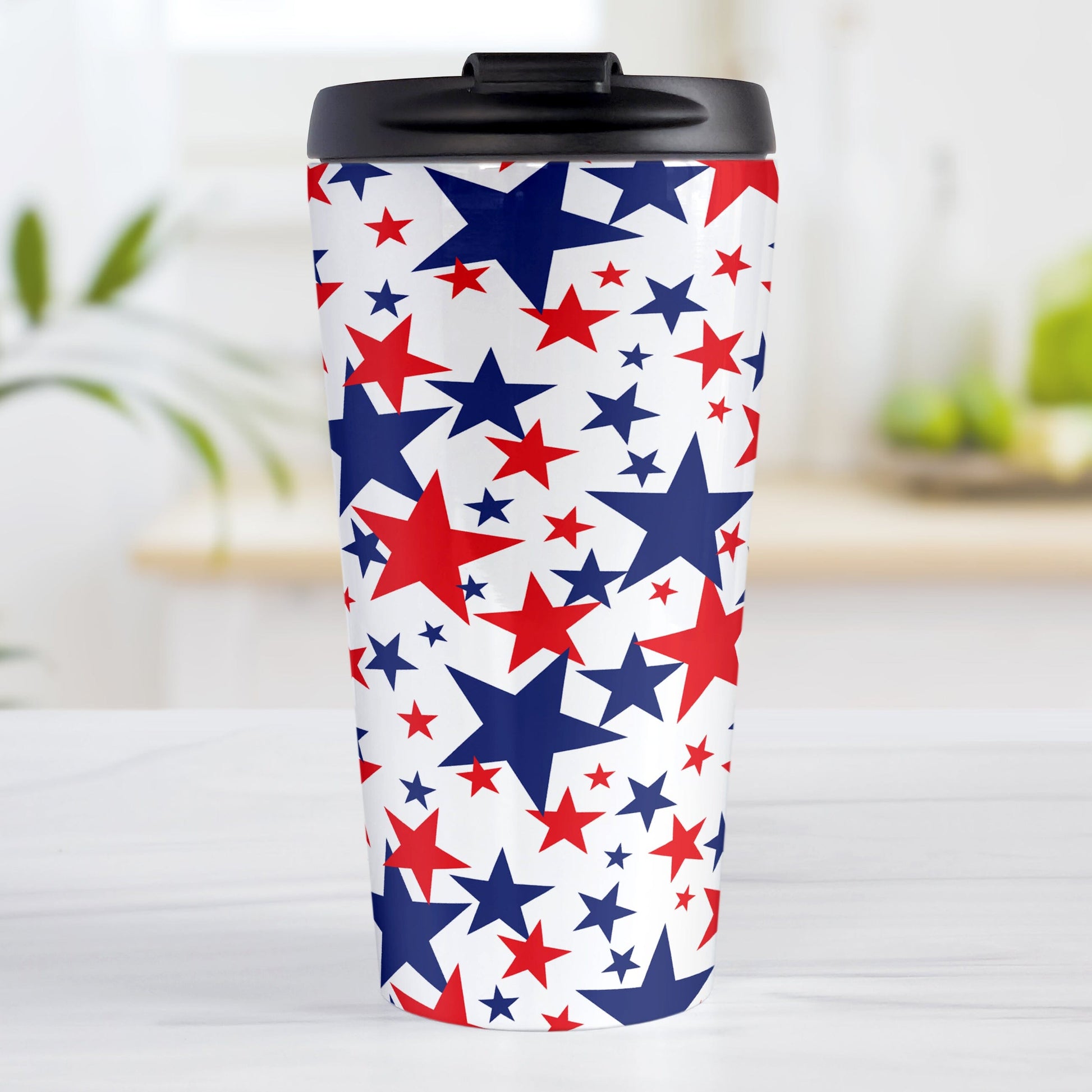 Patriotic Stars Travel Mug (15oz) at Amy's Coffee Mugs. A stainless steel travel mug for the 4th for July (Independence Day) designed with red and blue stars, in varying sizes, over a white background in a pattern that wraps around the mug.