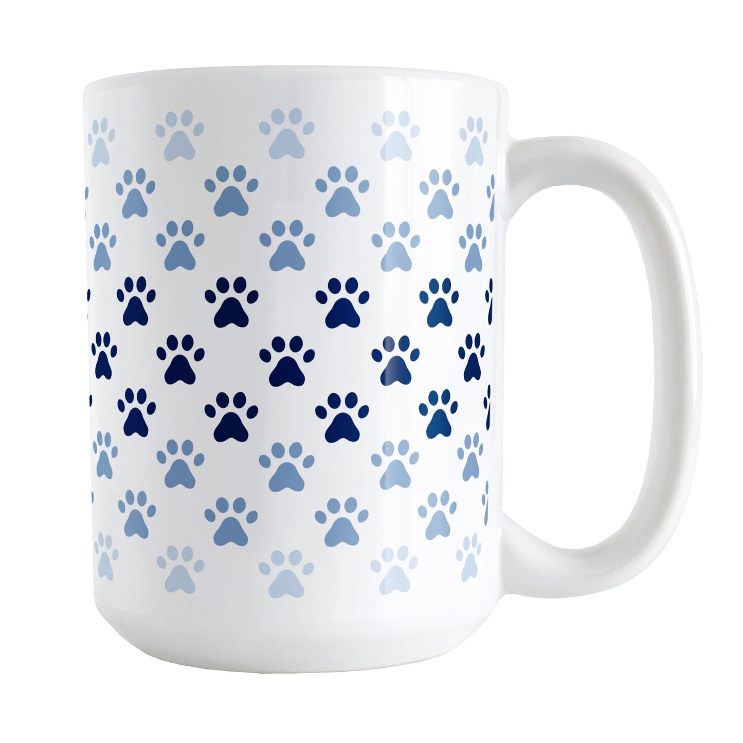 Paw Prints in Blue Mug (15oz) at Amy's Coffee Mugs. A ceramic coffee mug designed with paw prints in different shades of blue, with the darker blue color across the middle and the lighter blue along the top and bottom, in a pattern that wraps around the mug to the handle.