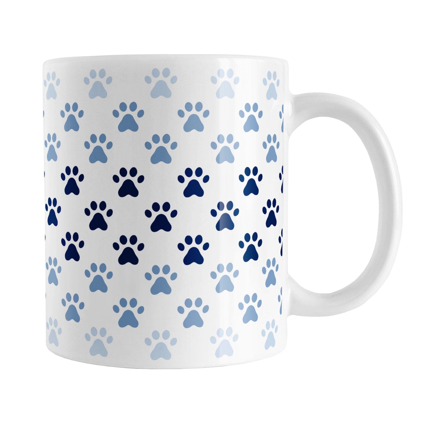 Paw Prints in Blue Mug (11oz) at Amy's Coffee Mugs. A ceramic coffee mug designed with paw prints in different shades of blue, with the darker blue color across the middle and the lighter blue along the top and bottom, in a pattern that wraps around the mug to the handle.