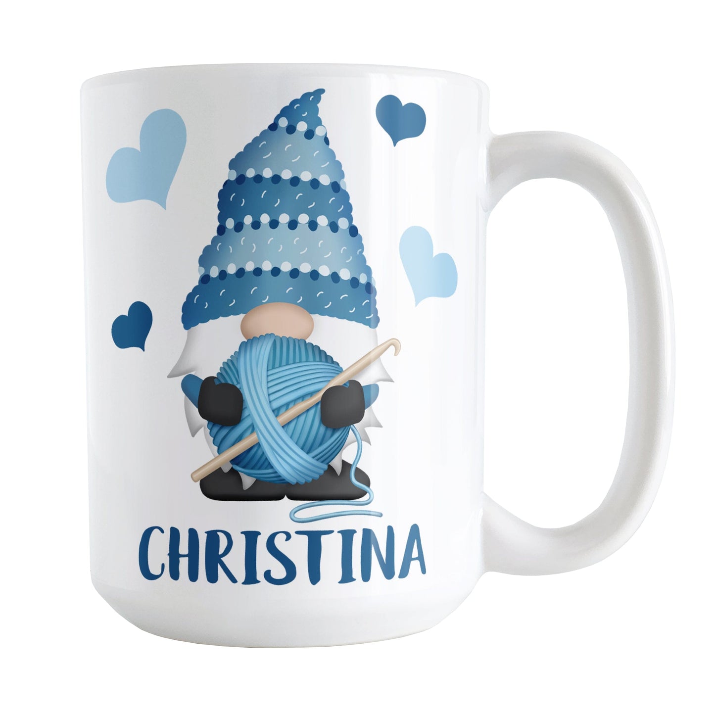 Personalized Blue Crochet Gnome Mug (15oz) at Amy's Coffee Mugs. A ceramic coffee mug designed with a cute gnome wearing a blue crochet hat while holding a ball of blue yarn and a crochet hook with blue hearts around him. Your name is printed in a fun blue font below the gnome. This adorable illustration and personalization is on both sides of the mug.