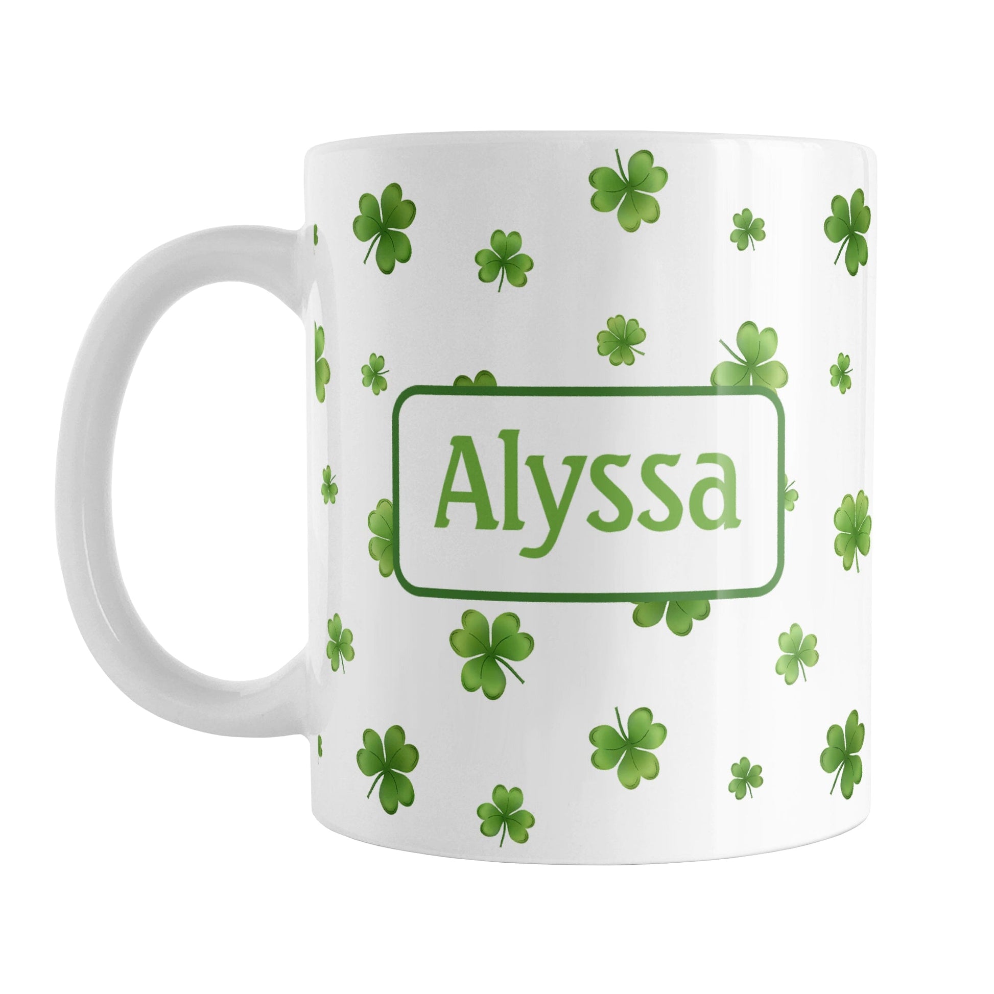 Personalized Dainty Shamrocks and Clovers Mug (11oz) at Amy's Coffee Mugs. A ceramic coffee mug designed with a print of hand-drawn green shamrocks and 4-leaf clovers in a dainty minimalist pattern that wraps around the mug up to the handle. Your personalized name is custom-printed on both sides of the mug in green.
