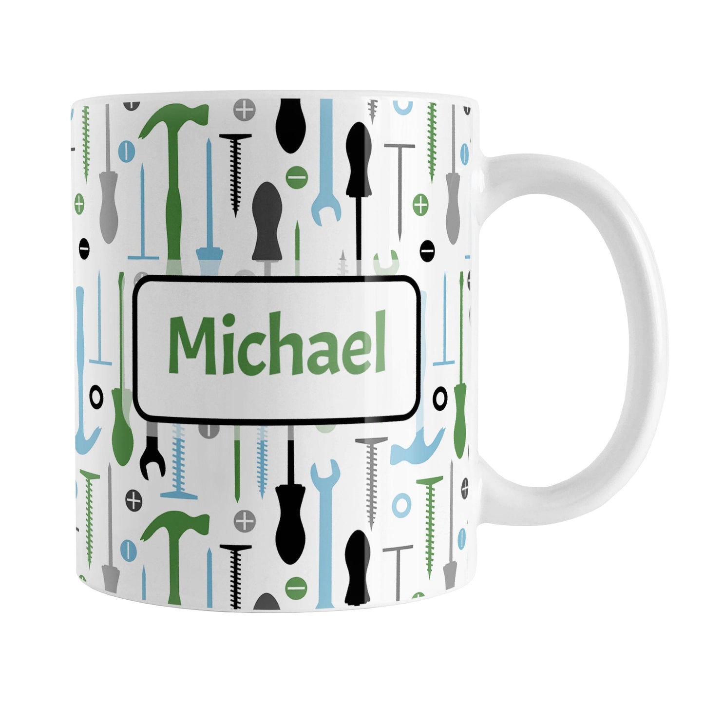 Personalized Green Blue Tools Pattern Mug (11oz) at Amy's Coffee Mugs. A ceramic coffee mug with a modern style pattern of tools in green, blue, black, and gray over white that wraps around the mug to the handle. Perfect for any handyman or contractor. Your name is printed in a green font on both sides of the mug over the tools pattern.