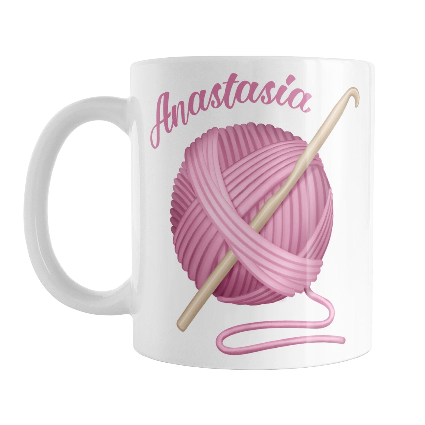 Personalized Pink Crochet Yarn Mug (11oz) at Amy's Coffee Mugs. A ceramic coffee mug designed with a large ball of pink yarn with a crochet hook through it. Your personalized name is printed in a pink script font curved along the top left edge of the ball of yarn.