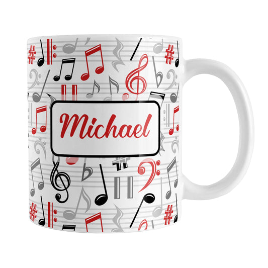 Personalized Red Music Notes Pattern Mug (11oz) at Amy's Coffee Mugs. A ceramic coffee mug designed with music notes and symbols in red, black, and gray in a pattern that wraps around the mug to the handle. Your personalized name is custom printed in a red script font on white over the music pattern design on both sides of the mug.