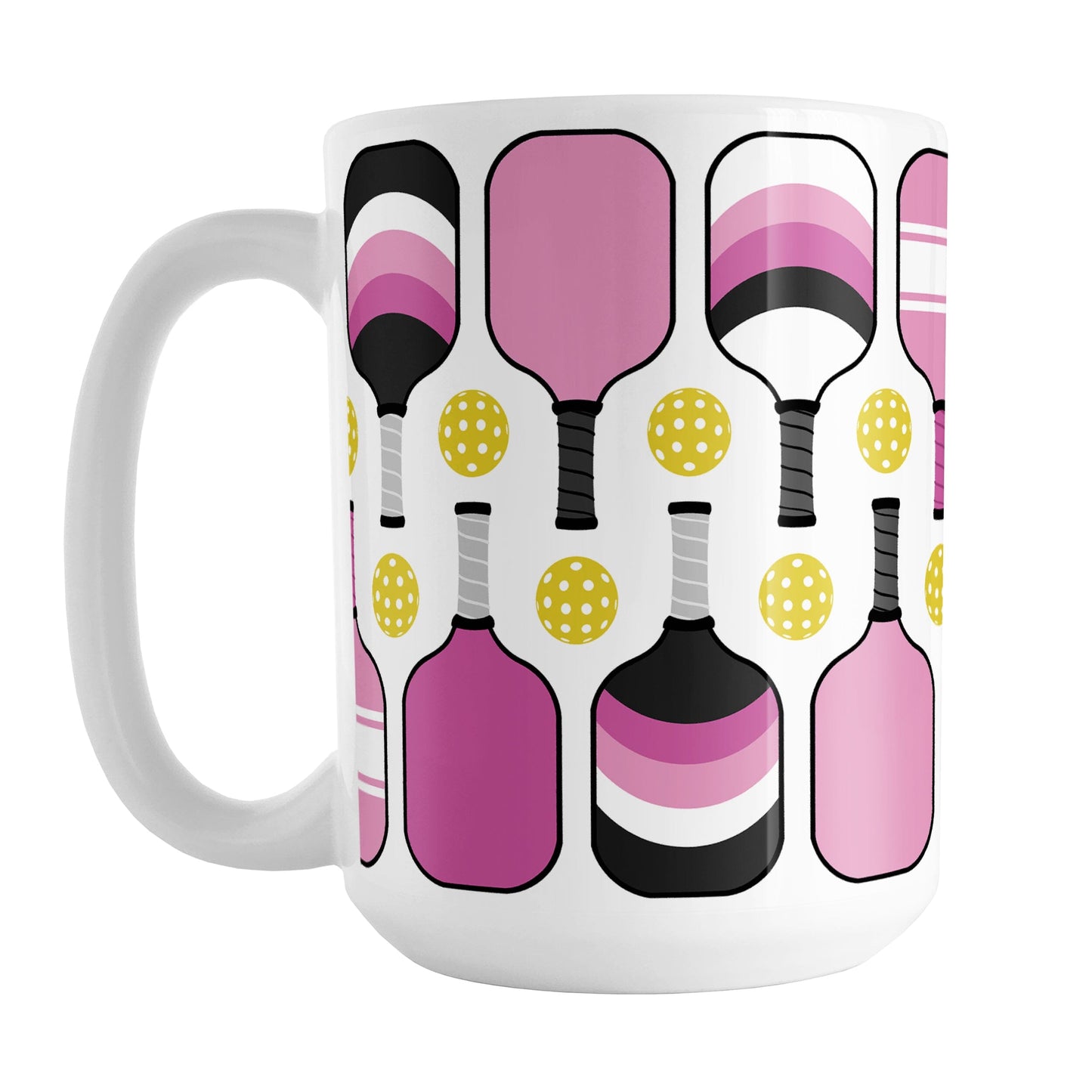Pink Pickleball Mug (15oz) at Amy's Coffee Mugs. A ceramic coffee mug designed with modern pink pickleball paddles and yellow balls in a pattern that wraps around the mug up to the handle.
