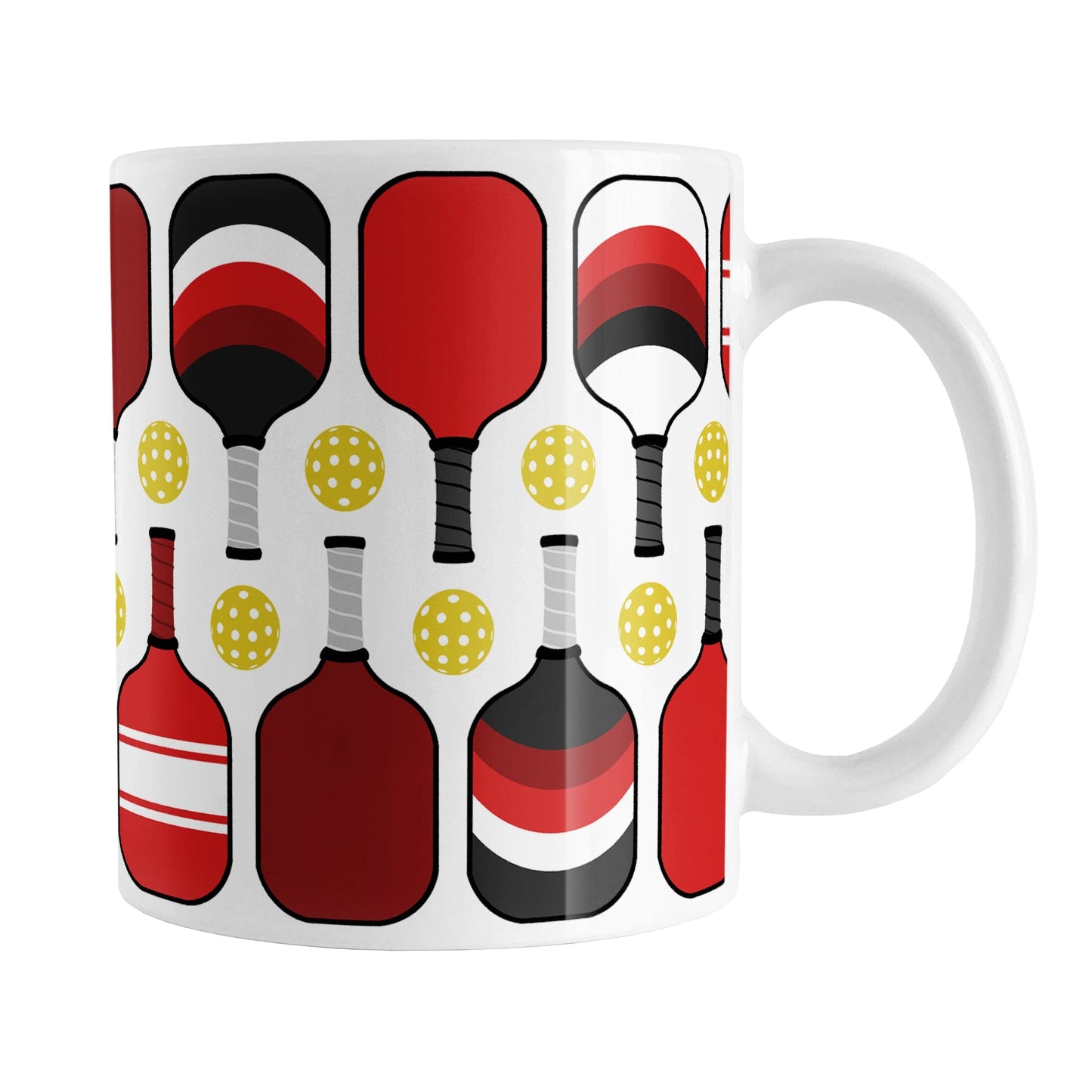 Red Pickleball Mug (11oz) at Amy's Coffee Mugs. A ceramic coffee mug designed with modern red pickleball paddles and yellow balls in a pattern that wraps around the mug up to the handle.