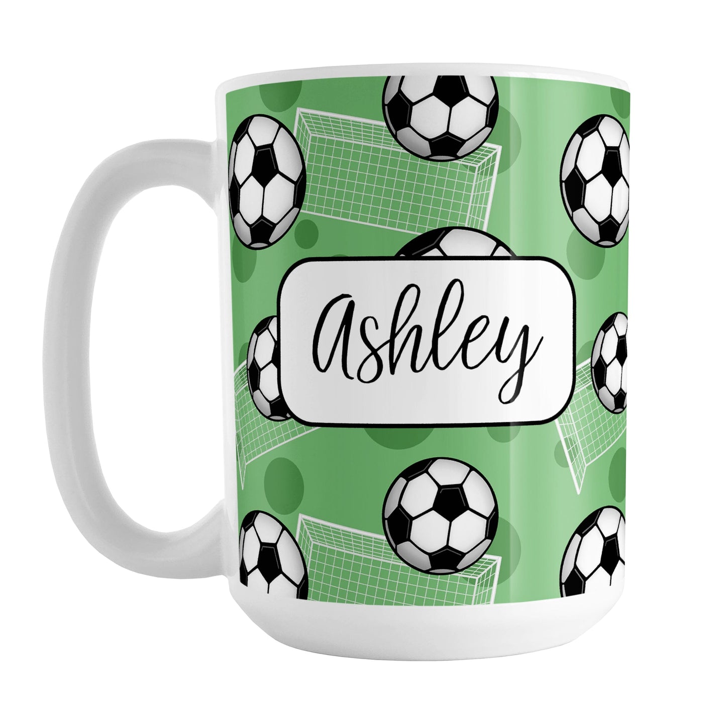 Soccer Ball and Goal Personalized Green Soccer Mug (15oz) at Amy's Coffee Mugs. A ceramic coffee mug designed with a pattern of soccer balls and white soccer goals over a green background with green circles. Your personalized name is custom-printed in a fun black script font on both sides of the mug over the soccer pattern.