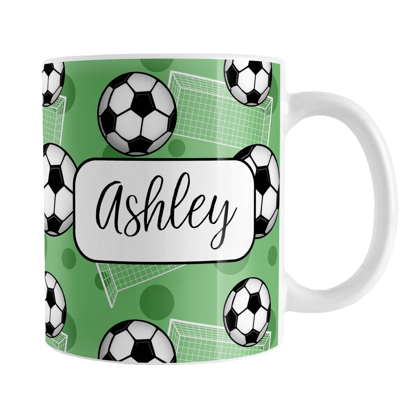 Soccer Ball and Goal Personalized Green Soccer Mug (11oz) at Amy's Coffee Mugs. A ceramic coffee mug designed with a pattern of soccer balls and white soccer goals over a green background with green circles. Your personalized name is custom-printed in a fun black script font on both sides of the mug over the soccer pattern.