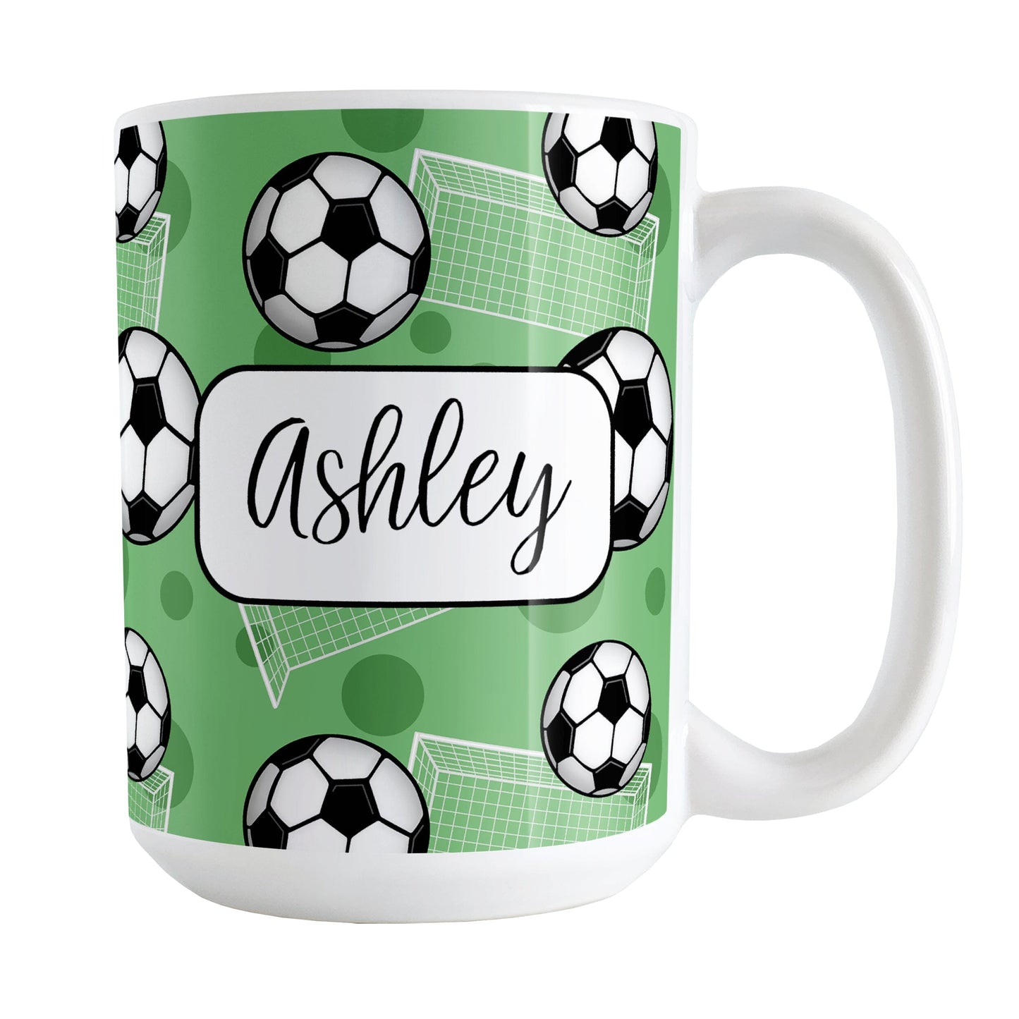 Soccer Ball and Goal Personalized Green Soccer Mug (15oz) at Amy's Coffee Mugs. A ceramic coffee mug designed with a pattern of soccer balls and white soccer goals over a green background with green circles. Your personalized name is custom-printed in a fun black script font on both sides of the mug over the soccer pattern.