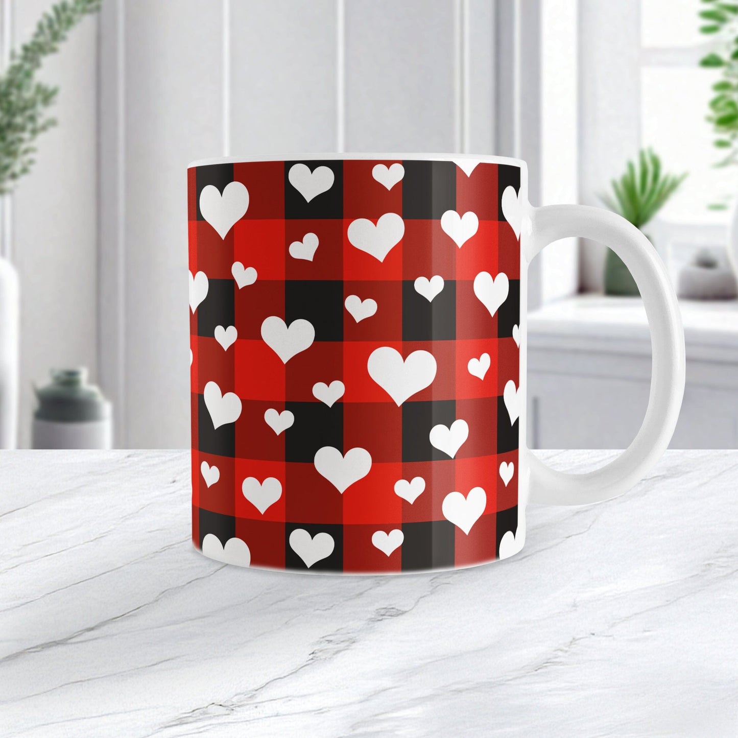 11oz white mug with red and black checkered (buffalo plaid) pattern and white hearts, on a marble countertop