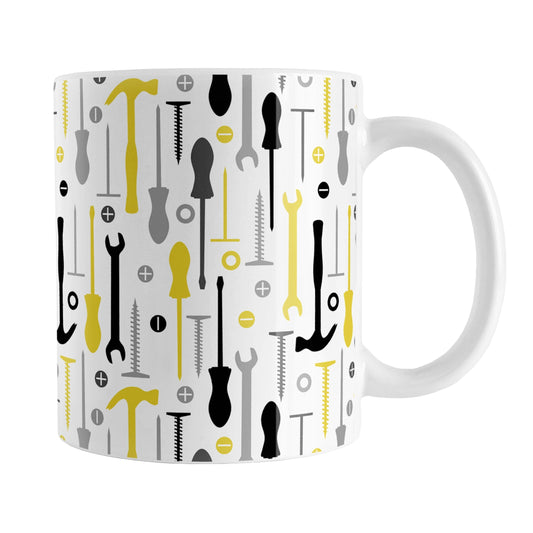 Yellow Tools Pattern Mug (11oz) at Amy's Coffee Mugs. A ceramic coffee mug with a modern style pattern of tools in yellow, black, and gray over white that wraps around the mug to the handle. Perfect for any handyman or contractor or anyone who loves working in their garage on their own.