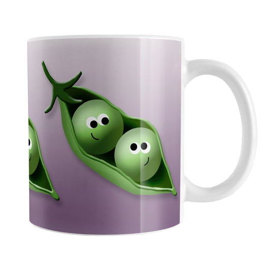 2 Peas in a Pod Mug (11oz) at Amy's Coffee Mugs. A ceramic coffee mug designed with an illustration of two peas in a pod smiling at each other over a gradient purple background color that wraps around the mug up to the handle. These adorable pea pods are shown on three sides of the mug.