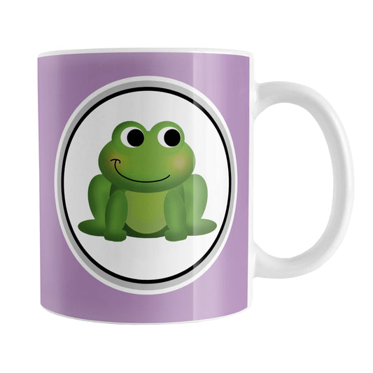 Adorable Purple Frog Mug (11oz) at Amy's Coffee Mugs. A ceramic coffee mug designed with a cute and happy green frog in a white circle on both sides of the mug over a purple background color that wraps around the mug up to the handle.