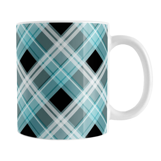 Alternative Turquoise Plaid Mug (11oz) at Amy's Coffee Mugs. A ceramic coffee mug designed with a diagonal turquoise, black, and white plaid pattern that wraps around the mug up to the handle.