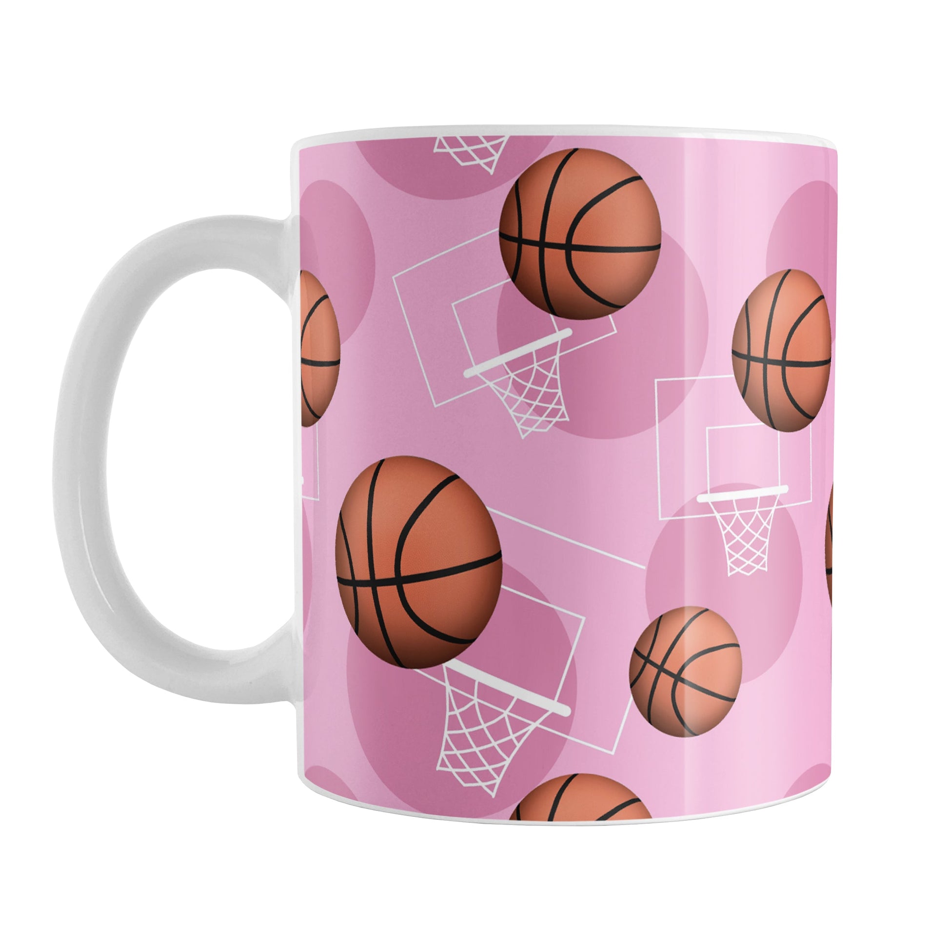 Basketball Themed Pattern - Pink Basketball Mug (11oz) at Amy's Coffee Mugs. A ceramic coffee mug designed with a sports themed pattern with basketballs and white hoops/nets over a pink colored background that wraps around the mug up to the handle.