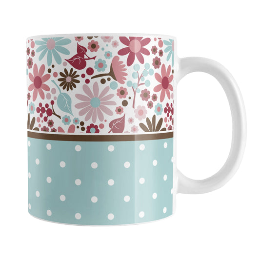 Berry Blue Summer Flowers Polka Dot Mug (11oz) at Amy's Coffee Mugs. A ceramic coffee mug designed with a pretty floral pattern in a gorgeous berry pink color palette, with light blue and brown along the top, and a light blue polka dot pattern along the bottom. These patterns wrap around the mug to the handle.