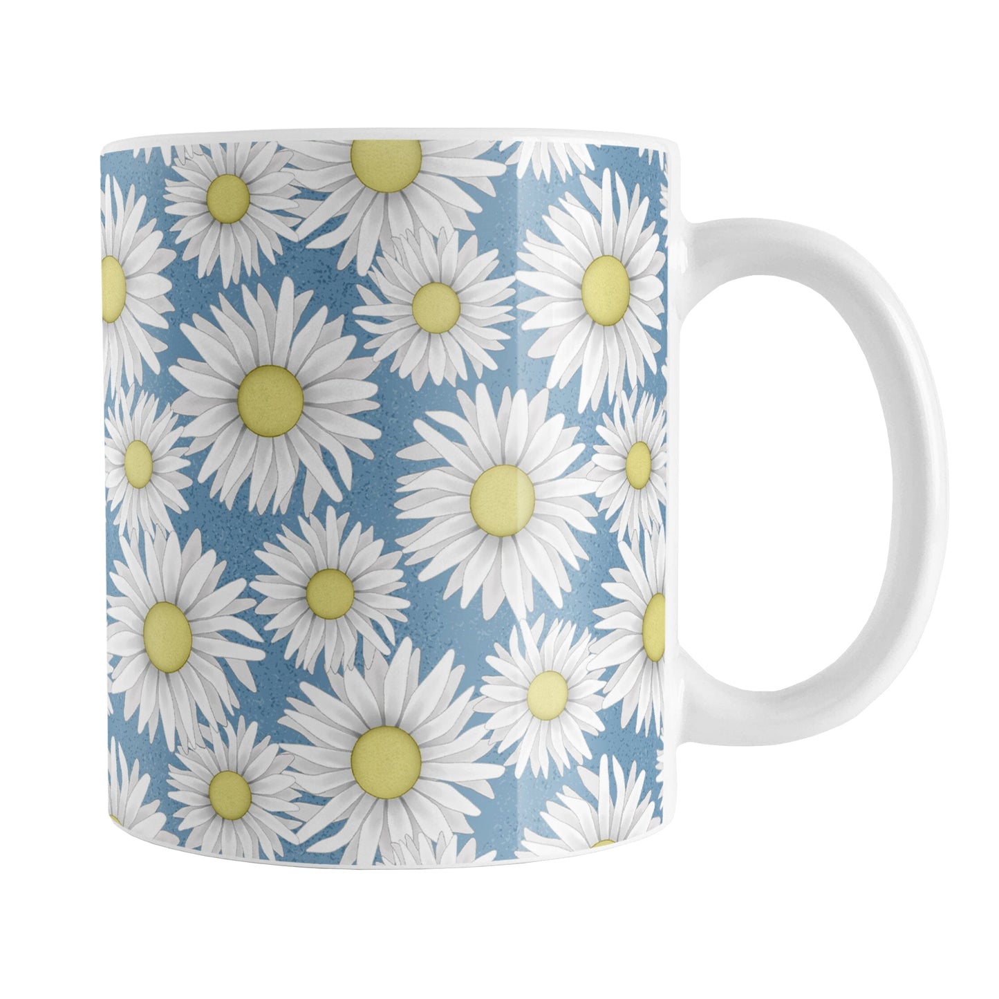 Blue Daisy Pattern Mug (11oz) at Amy's Coffee Mugs. A ceramic coffee mug designed with a pretty pattern of white daisy flowers with yellow centers over a speckled blue background that wraps around the mug to the handle.