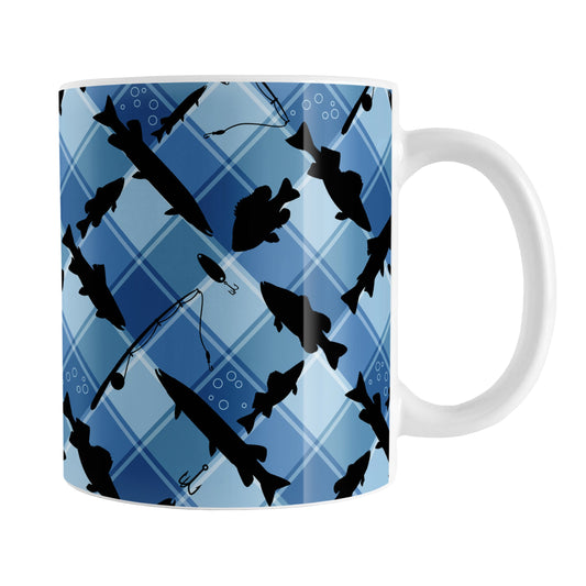 Blue Fishing Plaid Pattern Mug (11oz) at Amy's Coffee Mugs. A ceramic coffee mug designed with black silhouettes of fish, fishing poles, and lures diagonally arranged over a blue plaid pattern that wraps around the mug up to the handle.