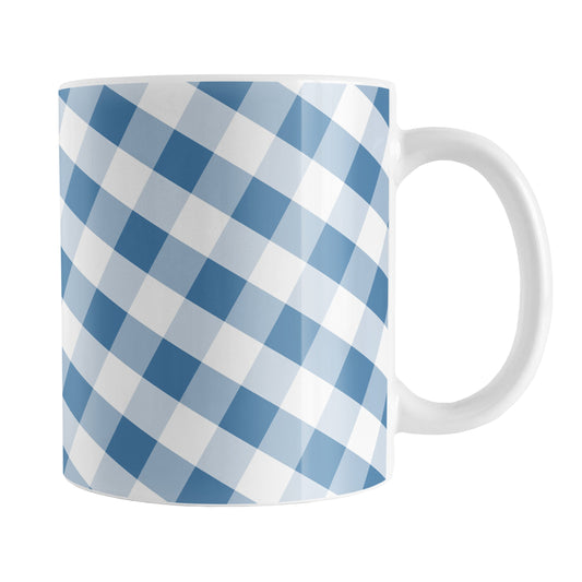 Blue Gingham Mug (11oz) at Amy's Coffee Mugs. A ceramic coffee mug designed with a slanted blue and white gingham pattern that wraps around the mug up to the handle.