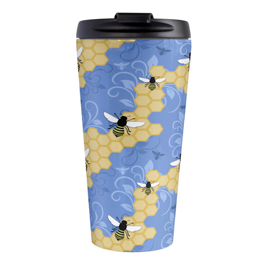 Blue Honeycomb Bee Travel Mug (15oz, stainless steel insulated) at Amy's Coffee Mugs. A travel mug designed with a pattern of black and yellow bees on honeycomb lines over a blue flourish background that wraps around the tapered shaped mug.