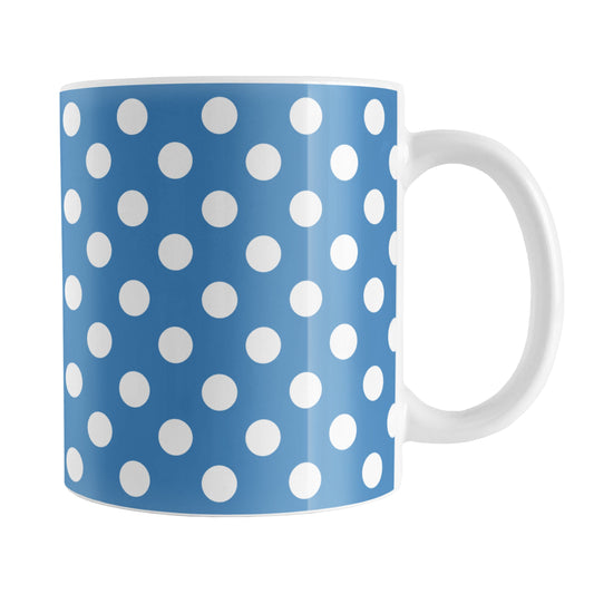 Blue Polka Dot Mug (11oz) at Amy's Coffee Mugs. A ceramic coffee mug designed with a pattern of white polka dots over a blue background color that wraps around the mug up to the handle.