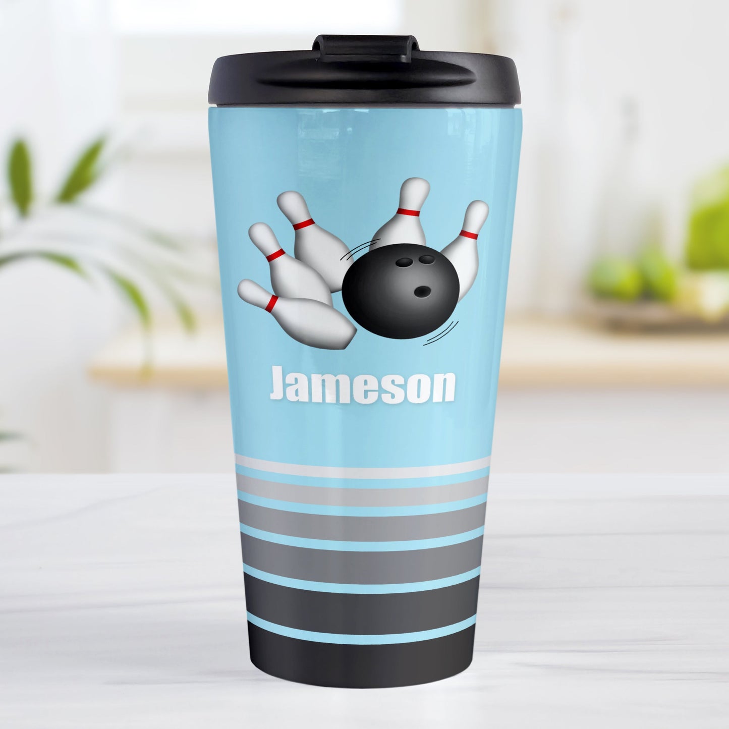 Bowling Ball and Pins Blue - Personalized Bowling Travel Mug (15oz, stainless steel insulated) at Amy's Coffee Mugs. A travel mug designed with an illustration of a bowling ball striking bowling pins over a light blue background color that wraps around the travel mug. Along the bottom of the mug are gray stripes in varying shades creating a dynamic look. Your custom name is printed in white below the bowling ball and pins.