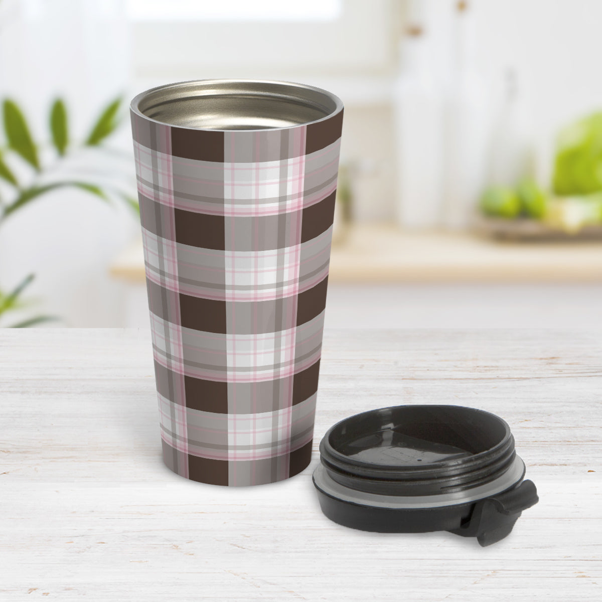 Brown Pink Plaid Travel Mug (15oz, stainless steel insulated) at Amy's Coffee Mugs. A travel mug designed with a traditional plaid pattern in varying shades of brown with accents of pink that wraps around the travel mug. Photo shows the mug open on a table with its lid beside it.