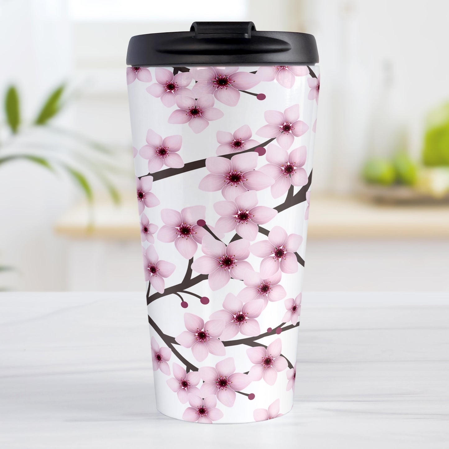 Cherry Blossom Travel Mug (15oz) at Amy's Coffee Mugs. A stainless steel insulated travel mug designed with a pattern of pink cherry blossom flowers on branches that wraps around the travel mug.