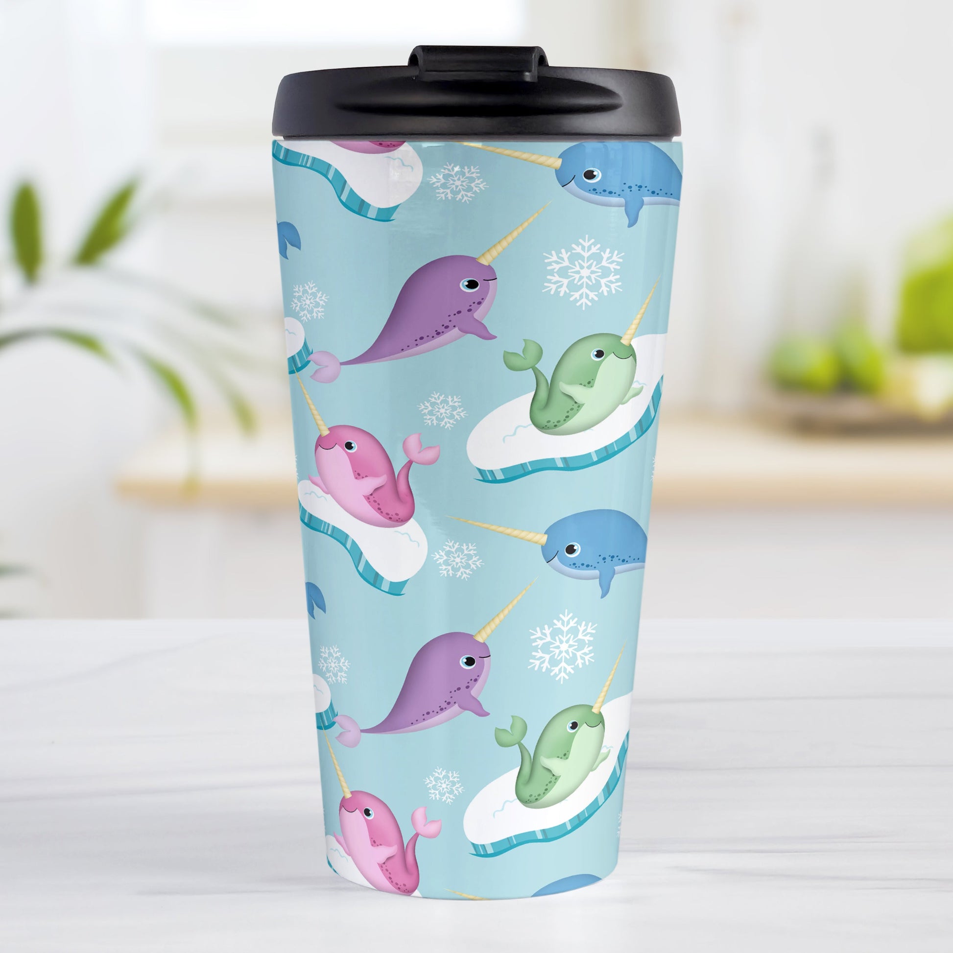 Colorful Arctic Narwhal Pattern Travel Mug (15oz, stainless steel insulated) at Amy's Coffee Mugs. A travel mug designed cute pink, purple, blue, and green narwhals with icebergs and snowflakes over a light blue colored background that wraps around the travel mug.