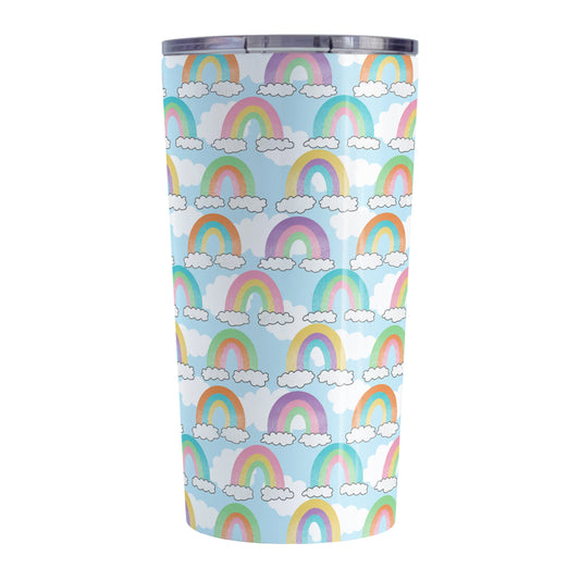 Colorful Rainbows Sky Pattern Tumbler Cup (20oz, stainless steel insulated) at Amy's Coffee Mugs. A tumbler cup designed with an illustration of different rainbows with three different semi-faded colors each sitting on clouds, over a blue sky with white clouds in the background that wraps around the cup.