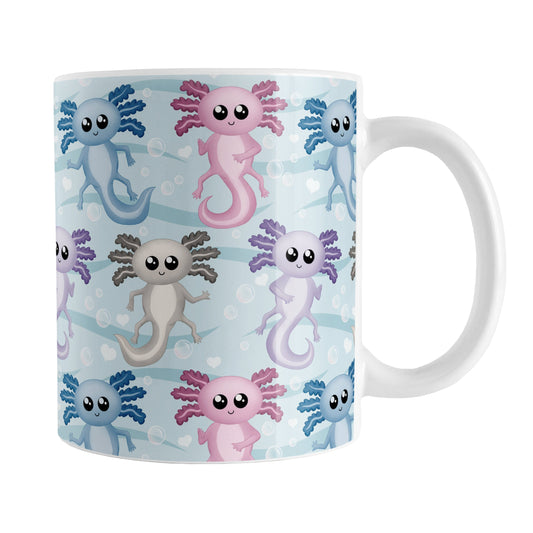 Colorful Underwater Axolotl Mug (11oz) at Amy's Coffee Mugs. A ceramic coffee mug designed with cute pink, blue, gray, and purple axolotls in a pattern over a blue water background with wavy lines, bubbles, and white hearts.