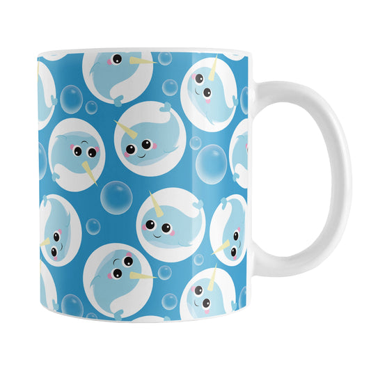Cute Blue Narwhal Bubble Pattern Mug (11oz) at Amy's Coffee Mugs. A ceramic coffee mug designed with cute light blue narwhals in white circles and with bubbles scattered over a blue background color in a pattern that wraps around the mug up to the handle.