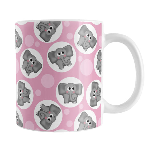 Cute Pink Elephant Pattern Mug (11oz) at Amy's Coffee Mugs. A ceramic coffee mug designed with cute and affectionate gray elephants in white circles scattered over a pink background color in a pattern that wraps around the mug up to the handle.