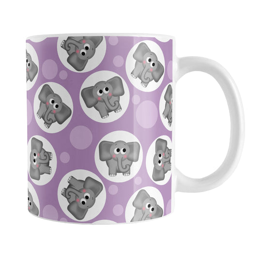 Cute Purple Elephant Pattern Mug (11oz) at Amy's Coffee Mugs. A ceramic coffee mug designed with cute and affectionate gray elephants in white circles scattered over a purple background color in a pattern that wraps around the mug up to the handle.