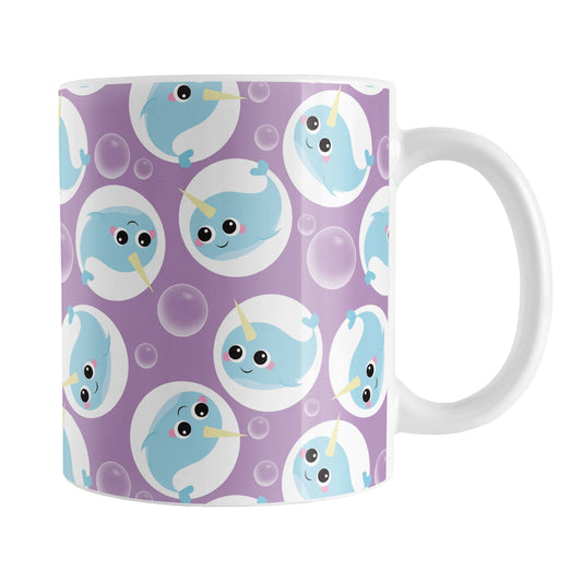 Cute Purple Narwhal Bubble Pattern Mug (11oz) at Amy's Coffee Mugs. A ceramic coffee mug designed with cute light blue narwhals in white circles and with bubbles scattered over a purple background color in a pattern that wraps around the mug up to the handle.