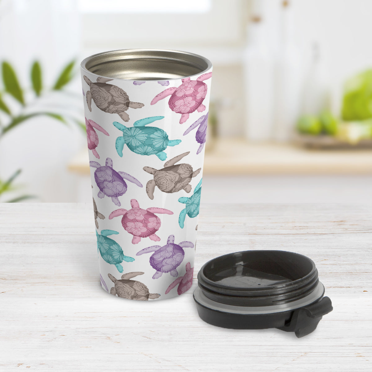 Cute Sea Turtles Pattern Travel Mug (15oz, stainless steel insulated) at Amy's Coffee Mugs. A travel mug with a pattern of sea turtles in a cute color palette of pink, purple, teal and brown that wraps around the travel mug. Each cute-colored sea turtle has a different floral watermark over its shell.