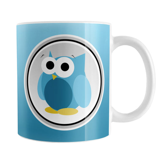 Funny Cute Blue Owl Mug (11oz) at Amy's Coffee Mugs. A ceramic coffee mug designed with a funny and cute blue owl in a white circle outlined in black and gray over a gradient blue background color that wraps around the mug to the handle. The owl illustration is on both sides of the mug.