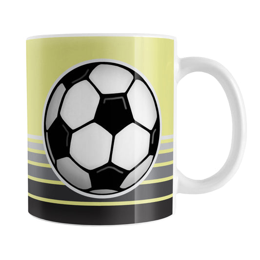 Gray Gradient Lined Yellow Soccer Ball Mug (11oz) at Amy's Coffee Mugs. A ceramic coffee mug designed with a big soccer ball on both sides of the mug over gradient black to gray lines along the bottom over a yellow background color that wraps around the mug up to the handle.