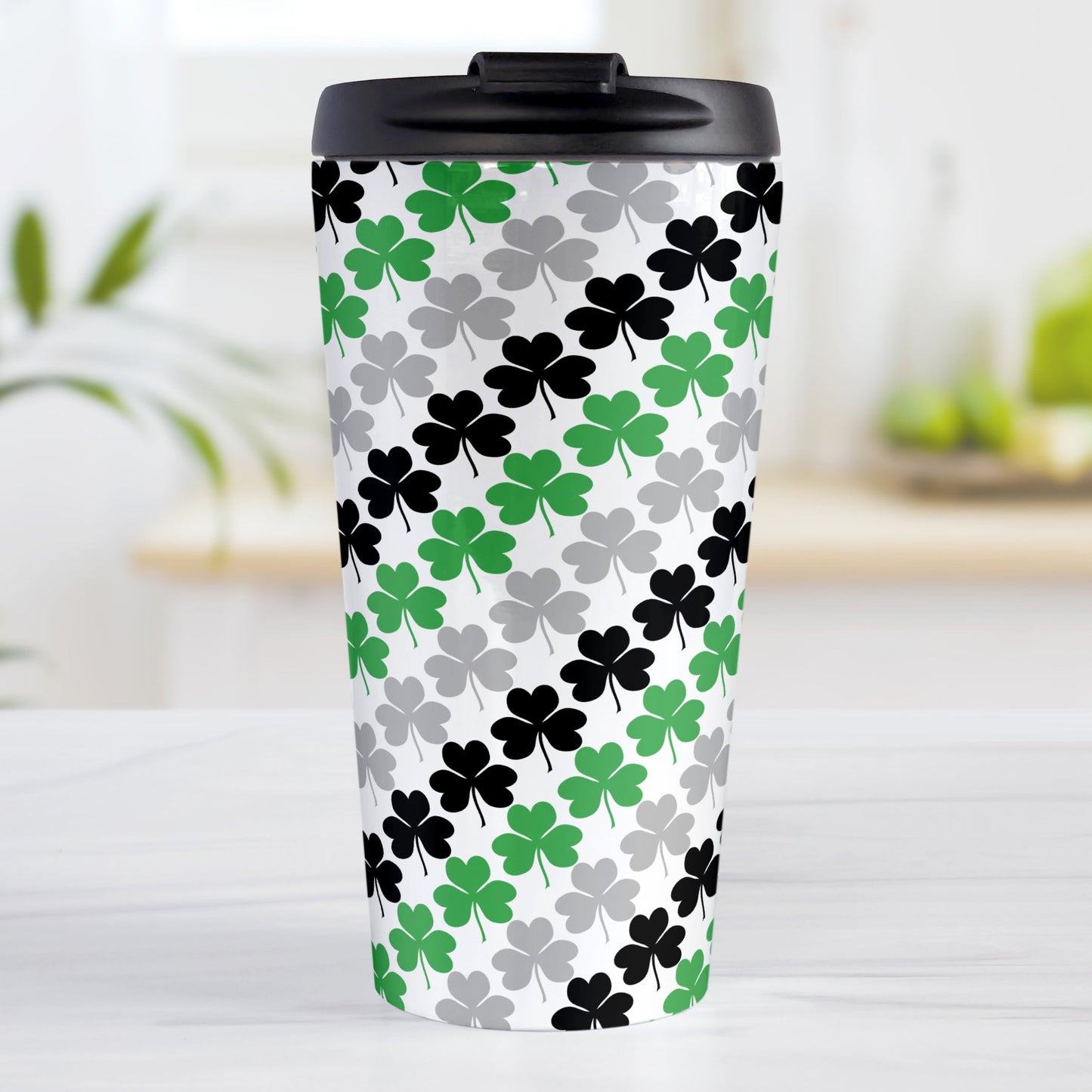 Green Black and Gray Clovers Travel Mug (15oz, stainless steel insulated) at Amy's Coffee Mugs. A travel mug designed with a pattern of green, black, and gray clovers (shamrocks) that wraps around the travel mug.