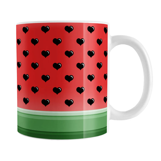 Hearts Pattern Watermelon Mug (11oz) at Amy's Coffee Mugs. A ceramic coffee mug designed with a heart seeds watermelon illustration that wraps around the mug up to the handle. It features a seed pattern of black hearts over red and a green stripes design along the bottom.