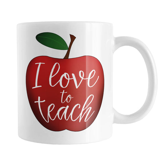 I Love to Teach - Red Apple Teacher Mug (11oz) at Amy's Coffee Mugs. A ceramic coffee mug designed with big red apple illustration with a green leaf, and the words "I love to teach" in a fun white script handwriting font fit to the inside of the apple, on both sides of the mug.