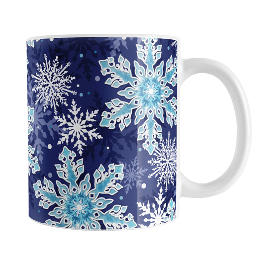 Navy Blue Aqua Snowflake Pattern Winter Mug (11oz) at Amy's Coffee Mugs. A ceramic coffee mug designed with a pattern of aqua blue and white snowflakes over a navy blue background color that wraps around the mug up to the handle.
