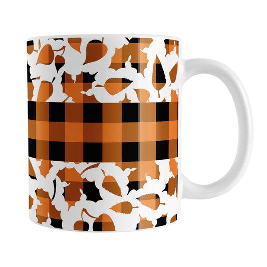 Orange Buffalo Plaid Leaves Fall Mug (11oz) at Amy's Coffee Mugs. A ceramic coffee mug designed with a pattern of leaves with an orange and black buffalo plaid pattern and a buffalo plaid stripe across the center over the leaves. This design wraps around the mug to the handle.