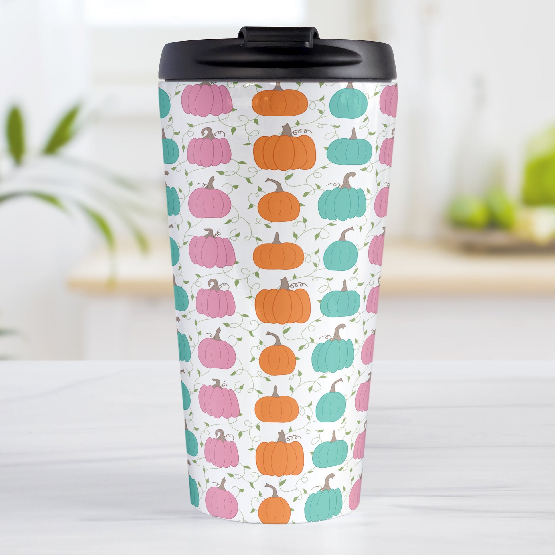 Orange Teal Pink Pumpkin Pattern Travel Mug (15oz, stainless steel insulated) at Amy's Coffee Mugs. A travel mug designed with a pattern of orange, teal, and pink pumpkins over a green vine and leaves pattern on a white background that wraps around the mug.